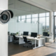 One of the best wireless security cameras for business installed in a modern office.