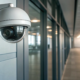 A security camera in a business office, a primary factor in how much a security system costs.