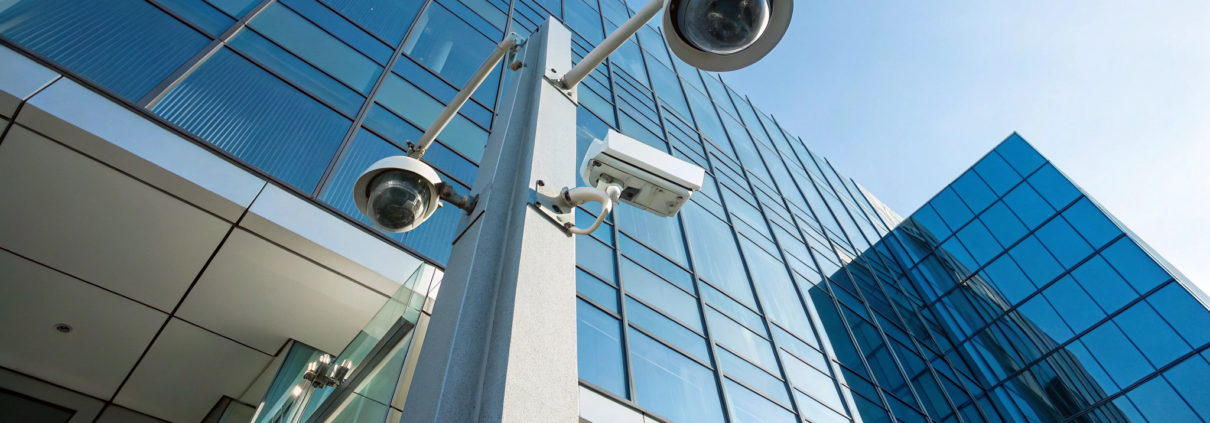 A modern office building protected by a comprehensive security camera system.