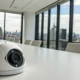A 4K security camera on a business conference table, a key part of the best security system for a business.