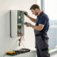 Professional technician providing alarm system repair in Atlanta.