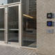 Atlanta business entrance with commercial alarm keypad and access control reader