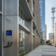 Modern commercial building with cellular network connectivity representing wireless alarm monitoring for Atlanta businesses