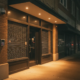 Commercial building at night in Atlanta with professional security signage visible near the entrance