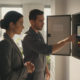 Fire alarm professional reviewing a commercial system with a Brookhaven business owner