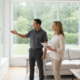 Technician consulting with a homeowner about wireless alarm installation