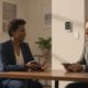 Atlanta business owner reviewing commercial alarm monitoring options with a security professional