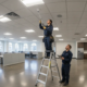 Fire safety specialist inspecting detectors in an Atlanta commercial building